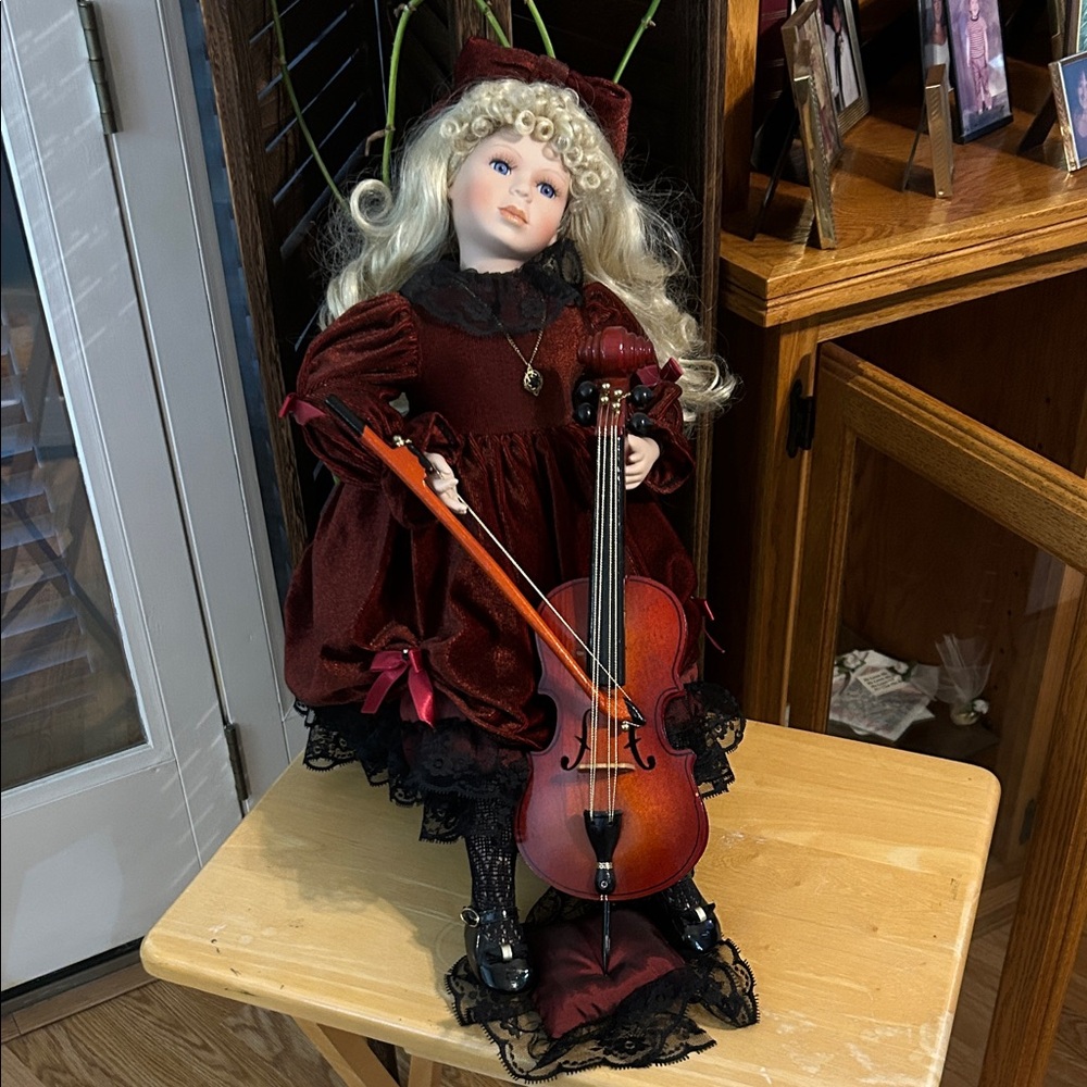 Kingstate the Doll Maker - Pamela with her cello